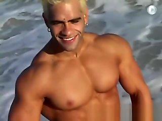 Gay Bodybuilder Joshua Fred! Thong on the beach!