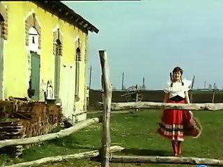 Brunette takes a piss and plays with cock